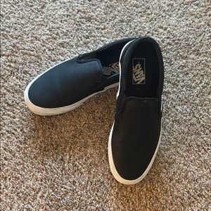 Vans women’s black leather slip ons. Size 10